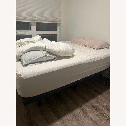 Used Amazon Black Metal Queen Bed for sale on AptDeco