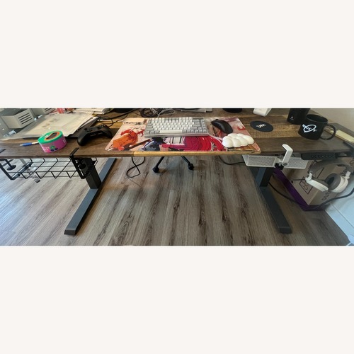Used Amazon Vari Wood Electronic Standing Desk 72*30 for sale on AptDeco