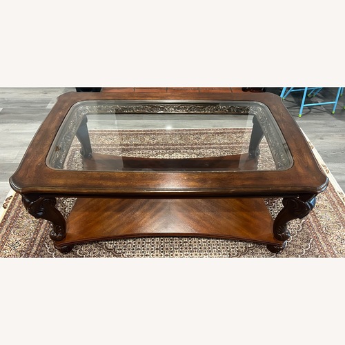Used Solid Wood with Glass Floor Shelf Coffee Table for sale on AptDeco