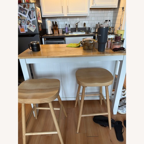 Used Wayfair Beachcrest Home White Wood Kitchen Island for sale on AptDeco