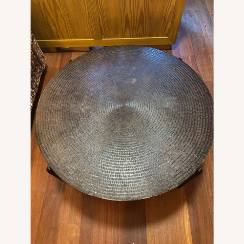 Used Crate & Barrel Sanskrit Dark Brown Metal Coffee Table for sale on AptDeco