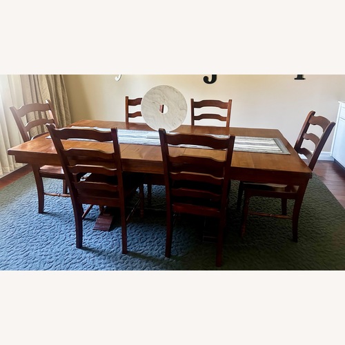 Used Trestle Dining Set for sale on AptDeco