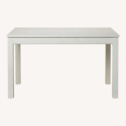 Used IKEA Laneberg Extendable White Wood Dining Table for sale on AptDeco