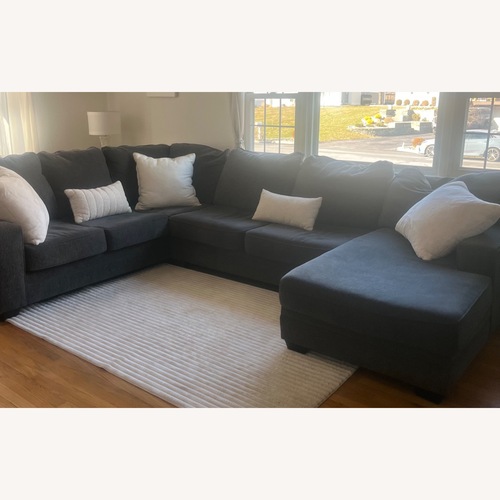 Used Raymour & Flanigan Dark Gray 3+ Piece Sectional for sale on AptDeco