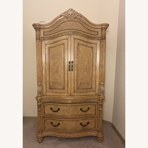 Used Light Brown Wood Armoire for sale on AptDeco