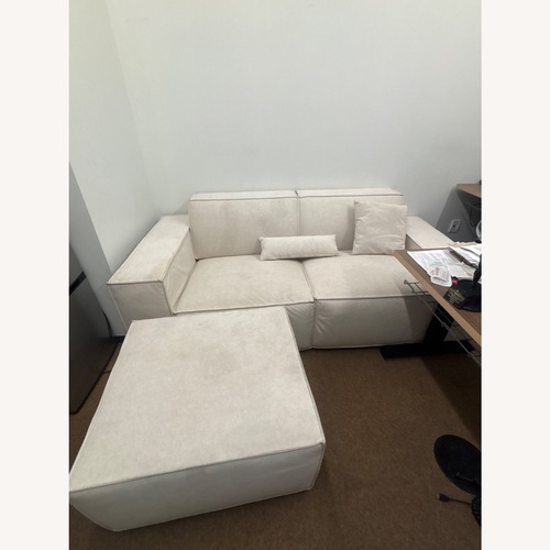 Used Povison Cream Colored Couch W Ottoman for sale on AptDeco