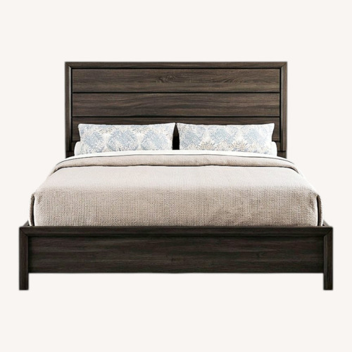 Used Black Wood King Bed for sale on AptDeco