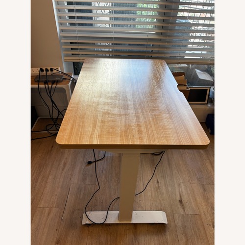 Used Branch Light Brown Wood Desk for sale on AptDeco