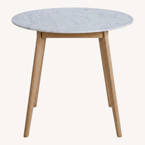 Used Article White Marble Dining Table for sale on AptDeco