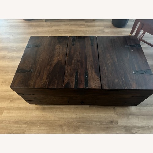 Used Pottery Barn Dark Brown Wood Coffee Table for sale on AptDeco