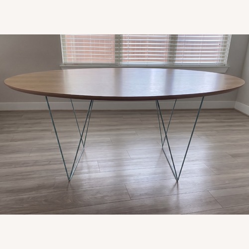 Used Wood Dining Table with Geometric Metal Legs for sale on AptDeco