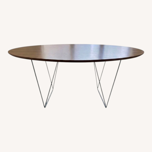 Used Wood Dining Table with Geometric Metal Legs for sale on AptDeco