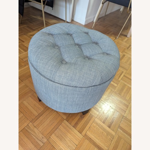 Used West Elm Blue Tufted Ottoman Storage Pouf  for sale on AptDeco