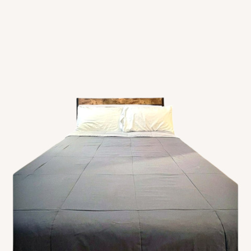 Used Ashley Furniture Dark Brown Queen Bed for sale on AptDeco