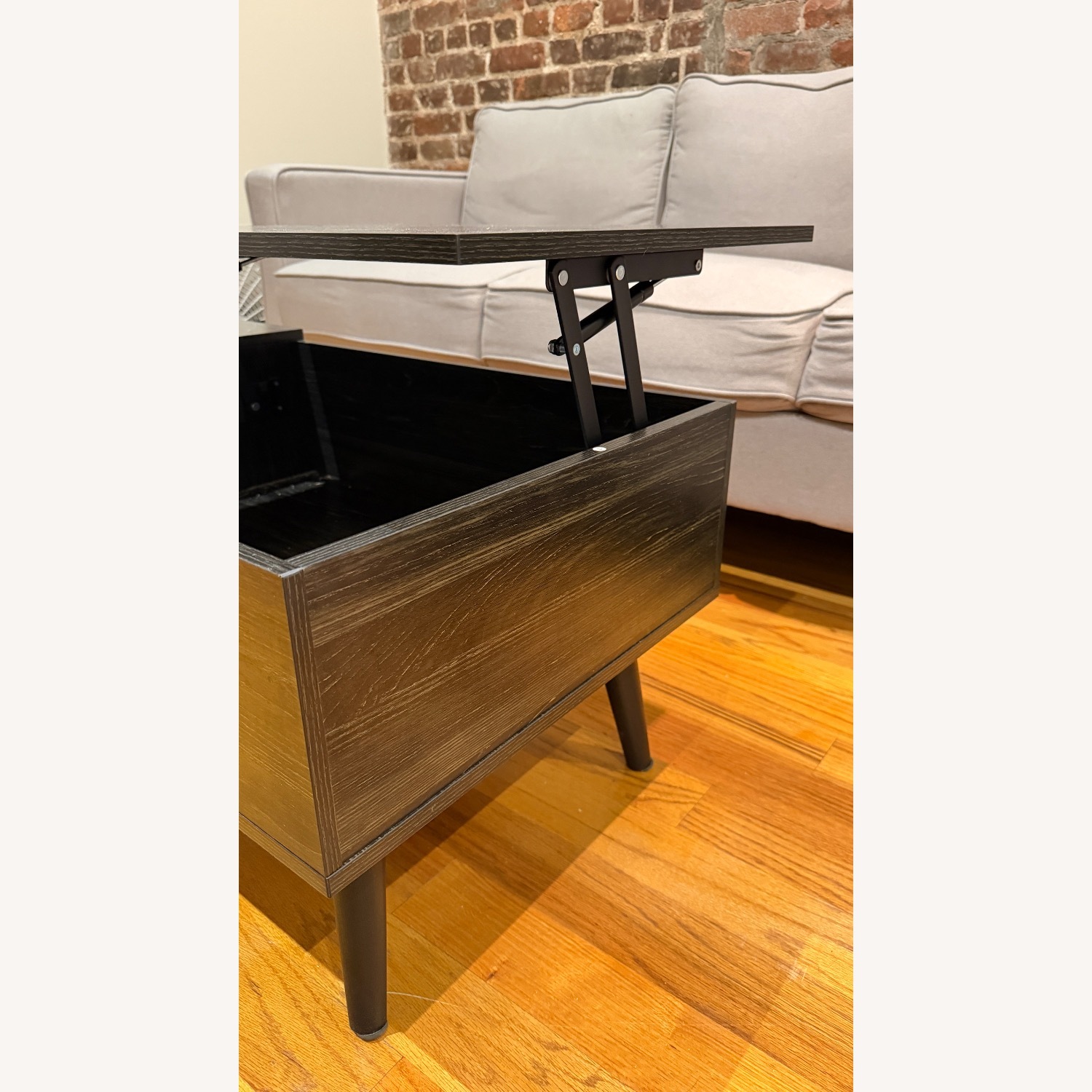Ashley Furniture Modern Dark Wood Coffee Table with Storage - image-5