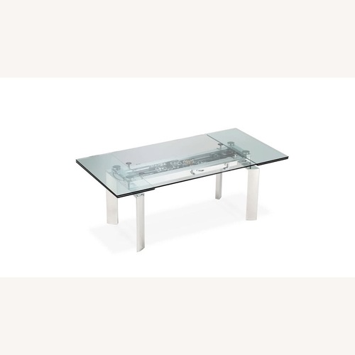 Used Roche Bobois Astrolab Silver Metal Dining Table for sale on AptDeco