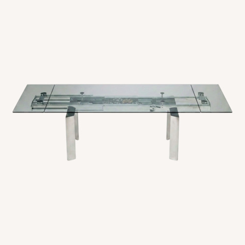 Used Roche Bobois Astrolab Silver Metal Dining Table for sale on AptDeco