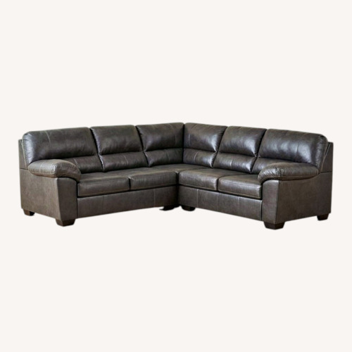 Used Dark Gray Suede 2 Piece Sectional with Ottoman  for sale on AptDeco