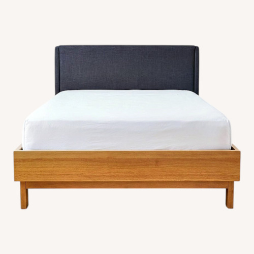 Used IKEA Light Brown Wood Queen Bed for sale on AptDeco