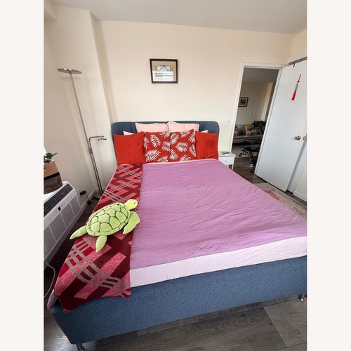Used IKEA Blue Fabric Queen Bed for sale on AptDeco