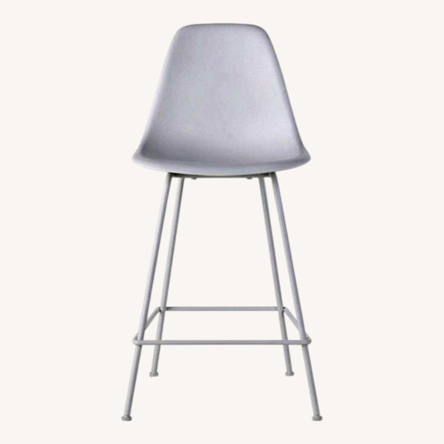 Used Eames White Plastic Stools W Blue Fabric Cushion for sale on AptDeco