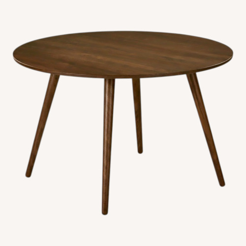 Used Article Walnut Rounded Dining Table for sale on AptDeco