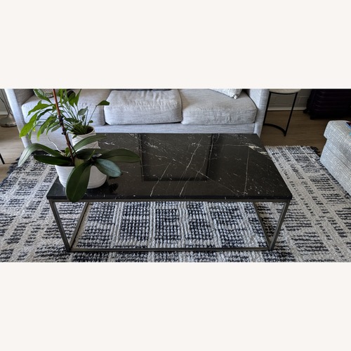 Used Black Marble Play Table for sale on AptDeco