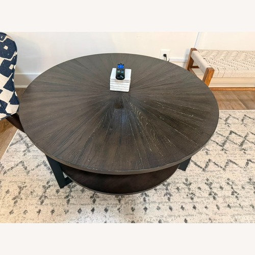 Used Ashley Furniture Black Wood Coffee Table for sale on AptDeco