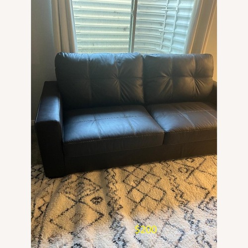 Used Living Spaces Dark Brown Loveseat for sale on AptDeco