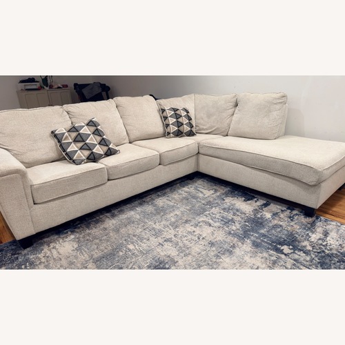 Used Ashley Furniture White Fabric 2 Piece Sectional for sale on AptDeco
