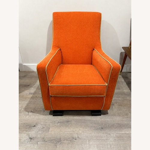 Used Monte Design Luca Orange Nursing Chair for sale on AptDeco