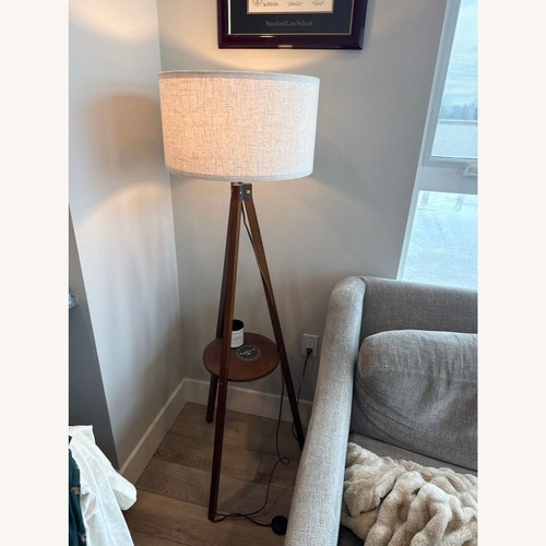 Used Modern Tripod Floor Lamp with Shelf and Fabric for sale on AptDeco