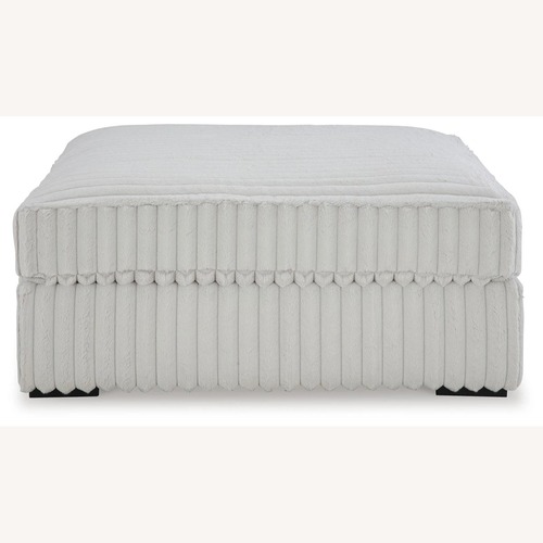Used Ashley Furniture White Fabric Ottoman for sale on AptDeco