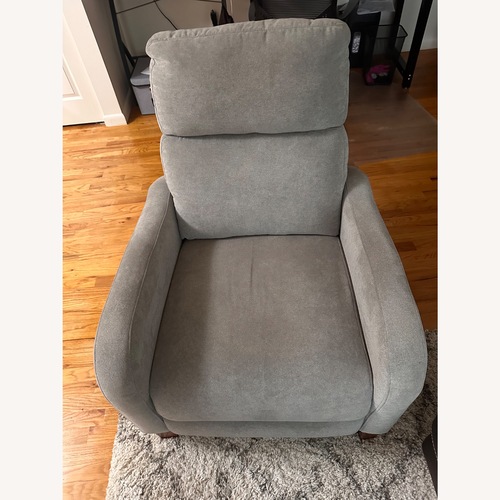 Used Raymour & Flanigan Tromley Light Gray Fabric Recliner for sale on AptDeco