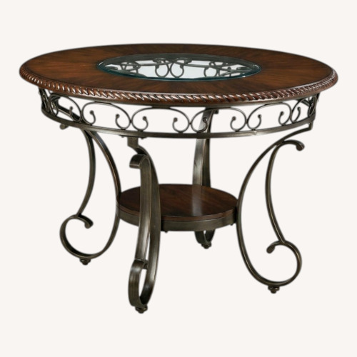 Used Ashley Furniture Dark Brown Wood Dining Table for sale on AptDeco