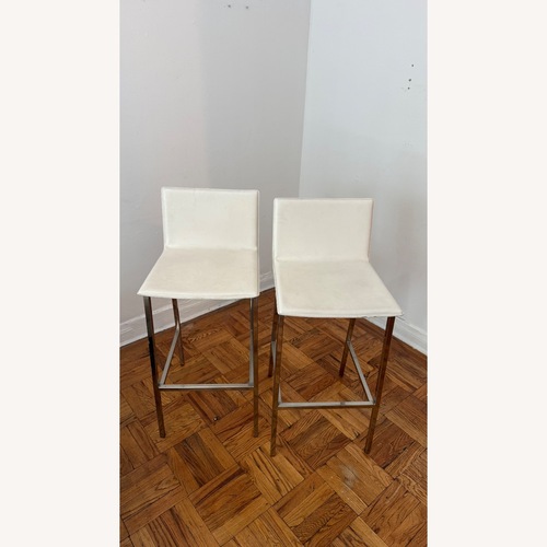 Used CB2 Phoenix White Leather Stools for sale on AptDeco