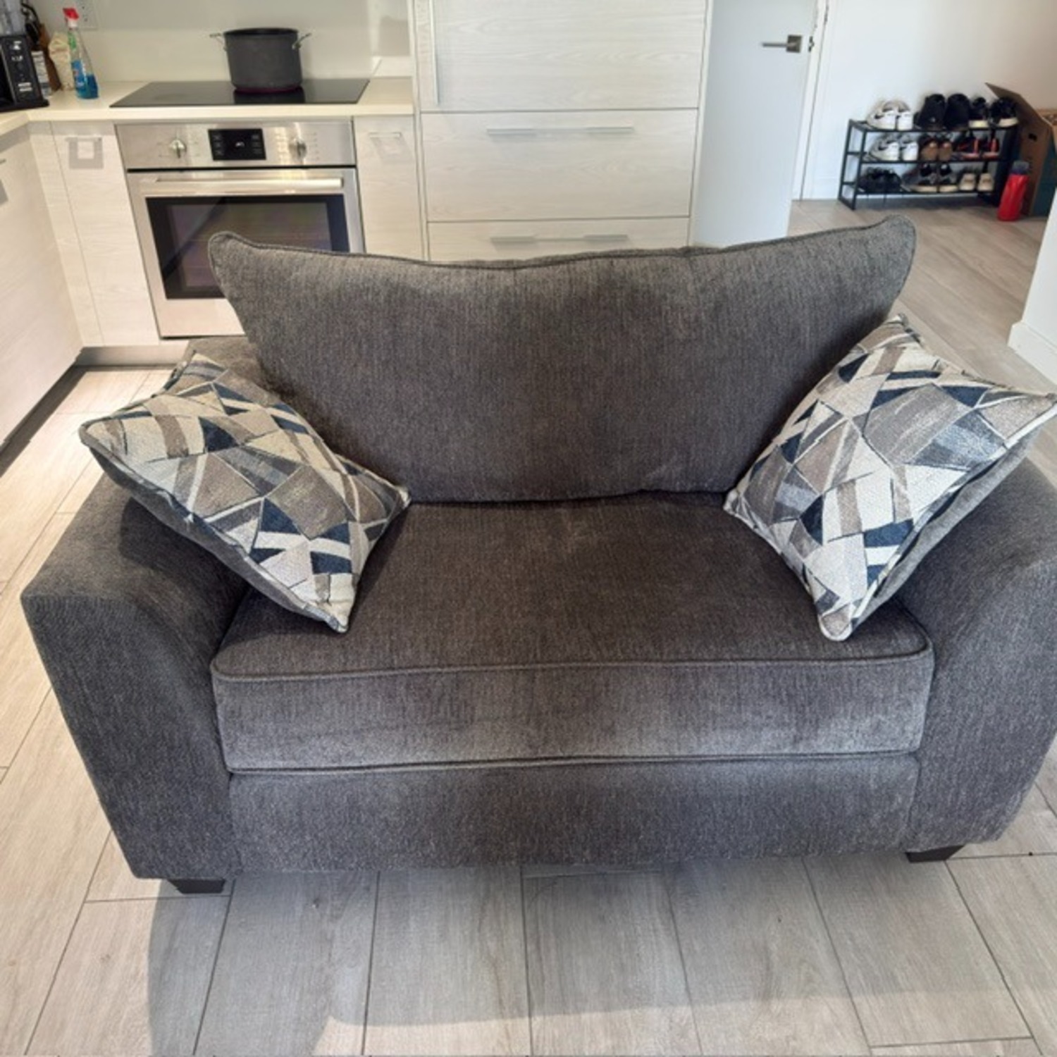 Rooms To Go Dark Gray Fabric Loveseat - image-1