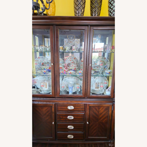 Used Raymour & Flanigan Dark Brown Wood China Cabinet for sale on AptDeco