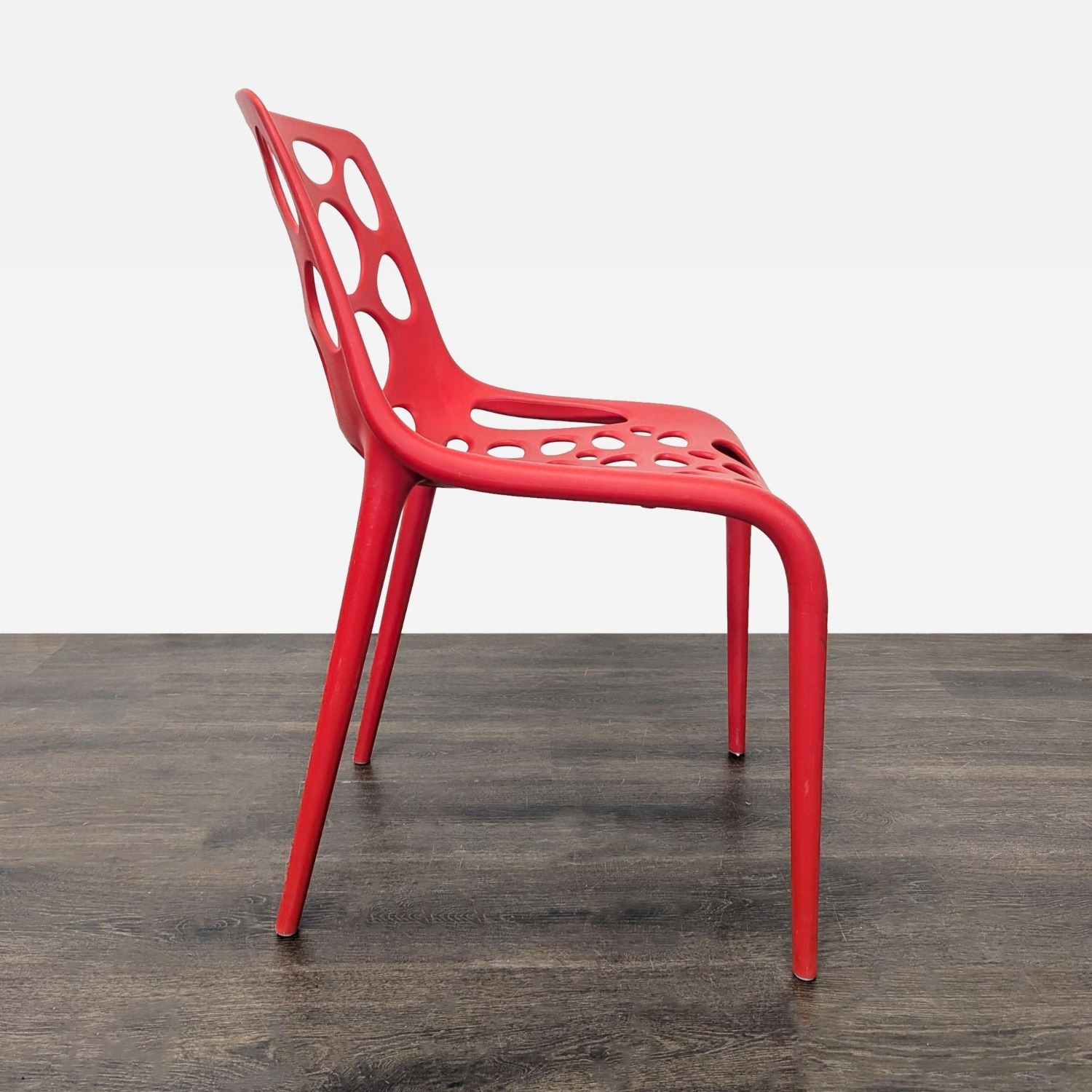 Red Plastic Dining Chair with Circle Cut-Outs	 - image-8