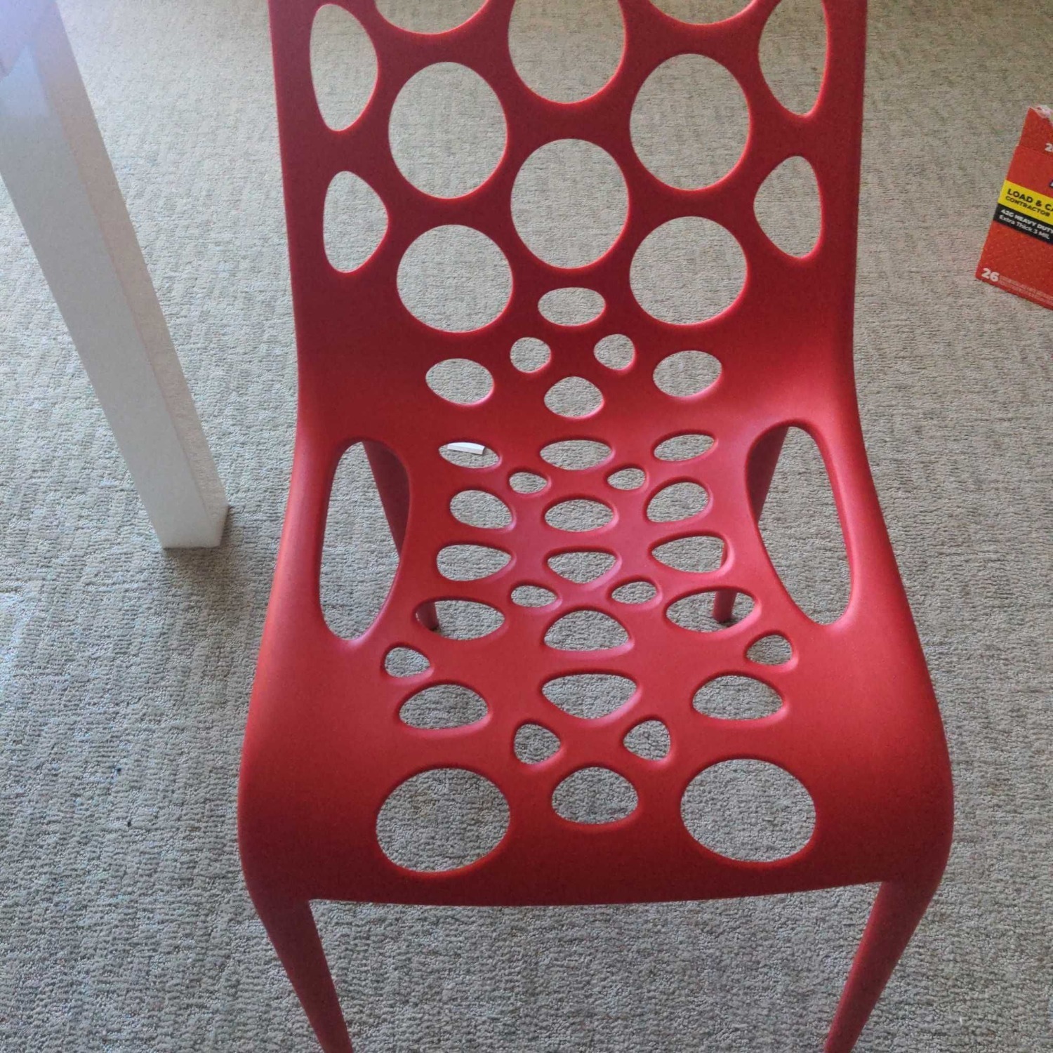 Red Plastic Dining Chair with Circle Cut-Outs	 - image-2