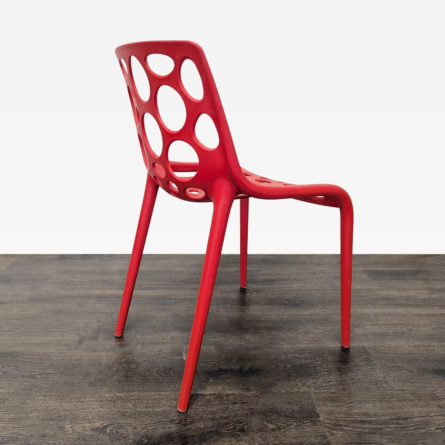 Red Plastic Dining Chair with Circle Cut-Outs	 - image-9