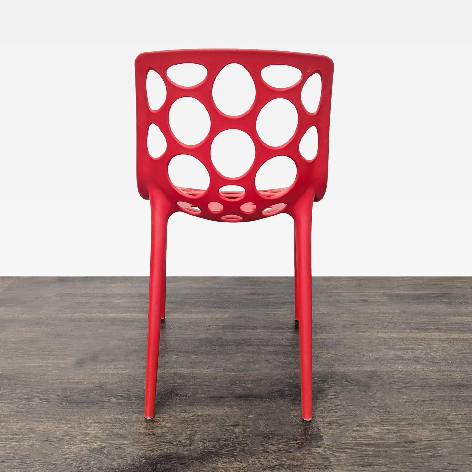 Red Plastic Dining Chair with Circle Cut-Outs	 - image-3