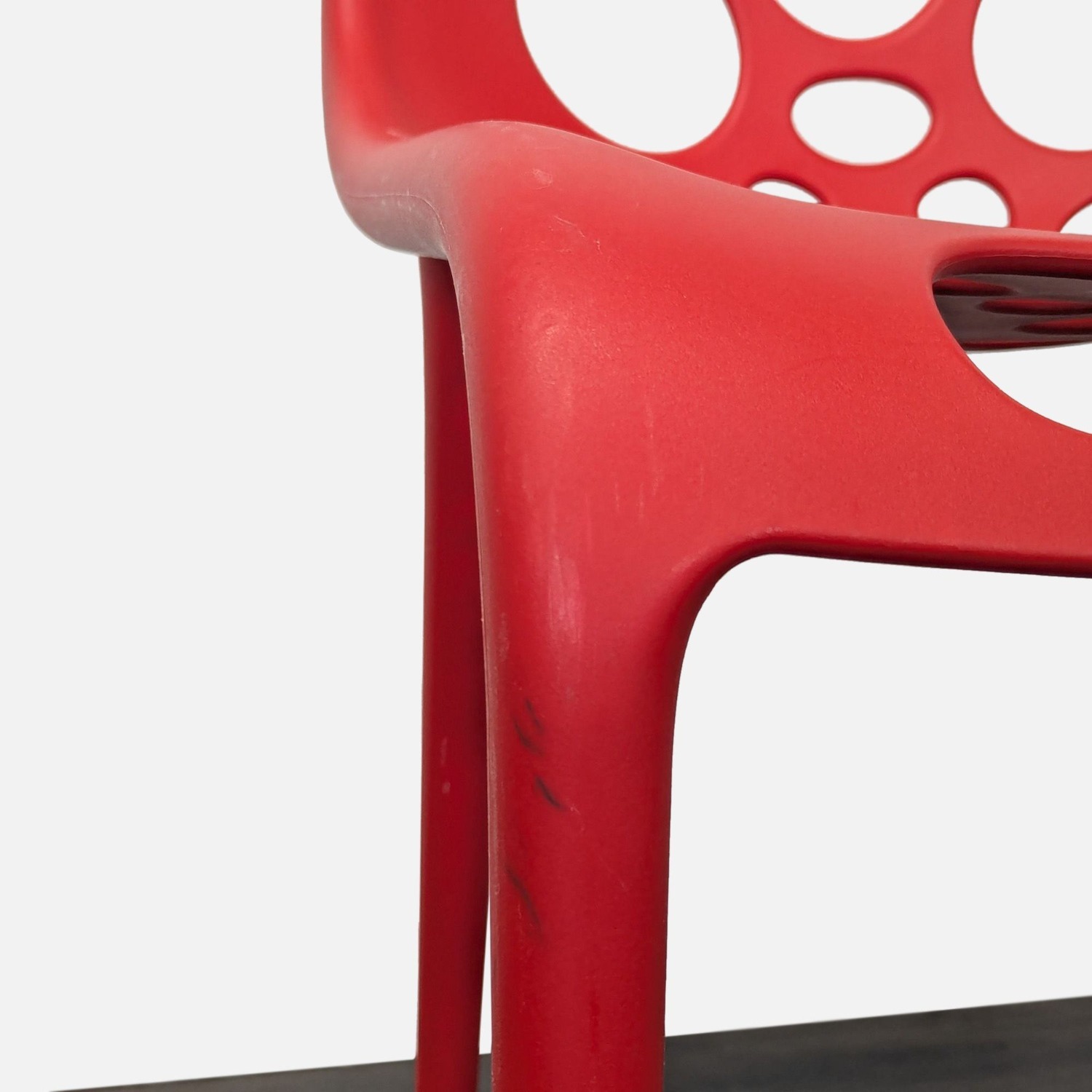 Red Plastic Dining Chair with Circle Cut-Outs	 - image-4