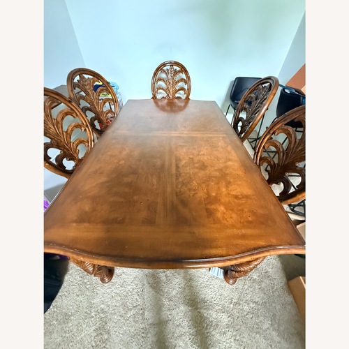 Used Hand Carved Original Dark Brown Wood Dining Set for sale on AptDeco