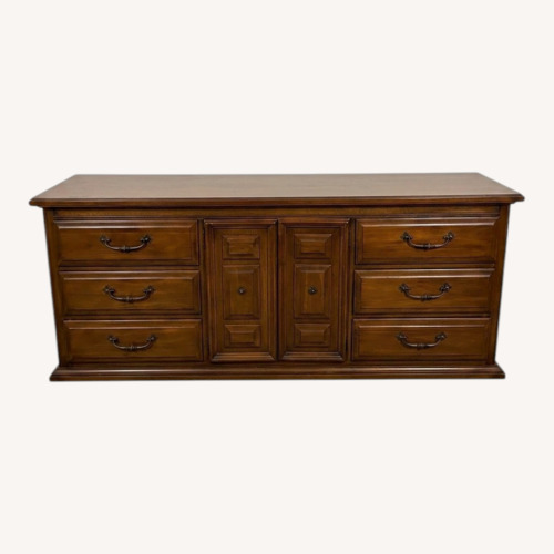 Used Vintage/Antique Finds Dark Brown Wood Dresser for sale on AptDeco