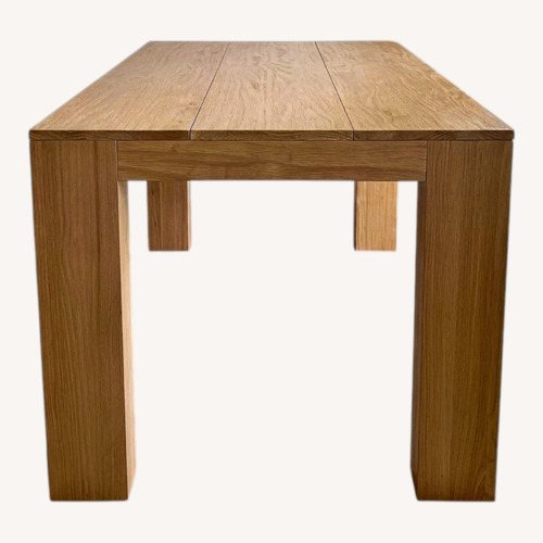 Used Natural Wood Dining Table for sale on AptDeco