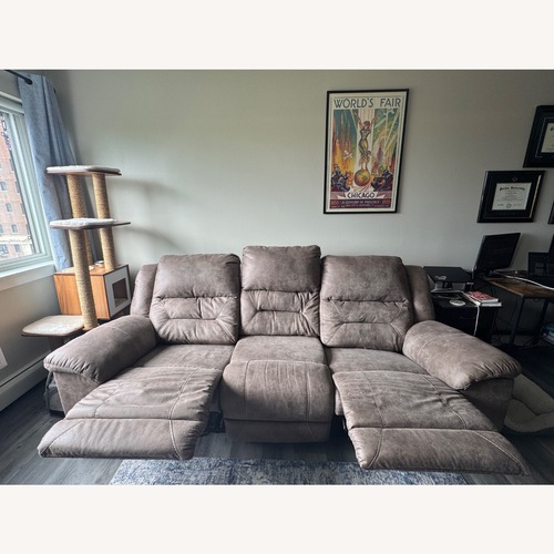 Used Light Brown Reclining Sofa for sale on AptDeco