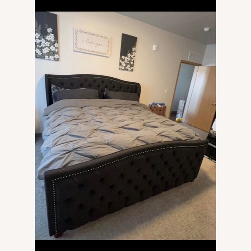 Used Black King Bed for sale on AptDeco