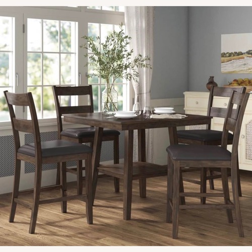 Used East Harptree 4 - Person Solid Wood Solid Wood Top Four Leg Dining Set for sale on AptDeco