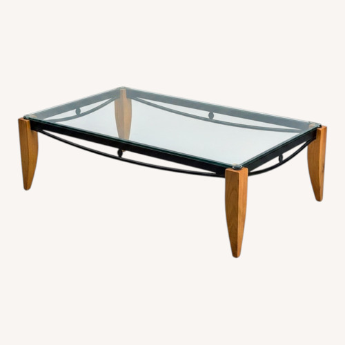 Used  Glass Top Coffee Table with Wood Legs for sale on AptDeco